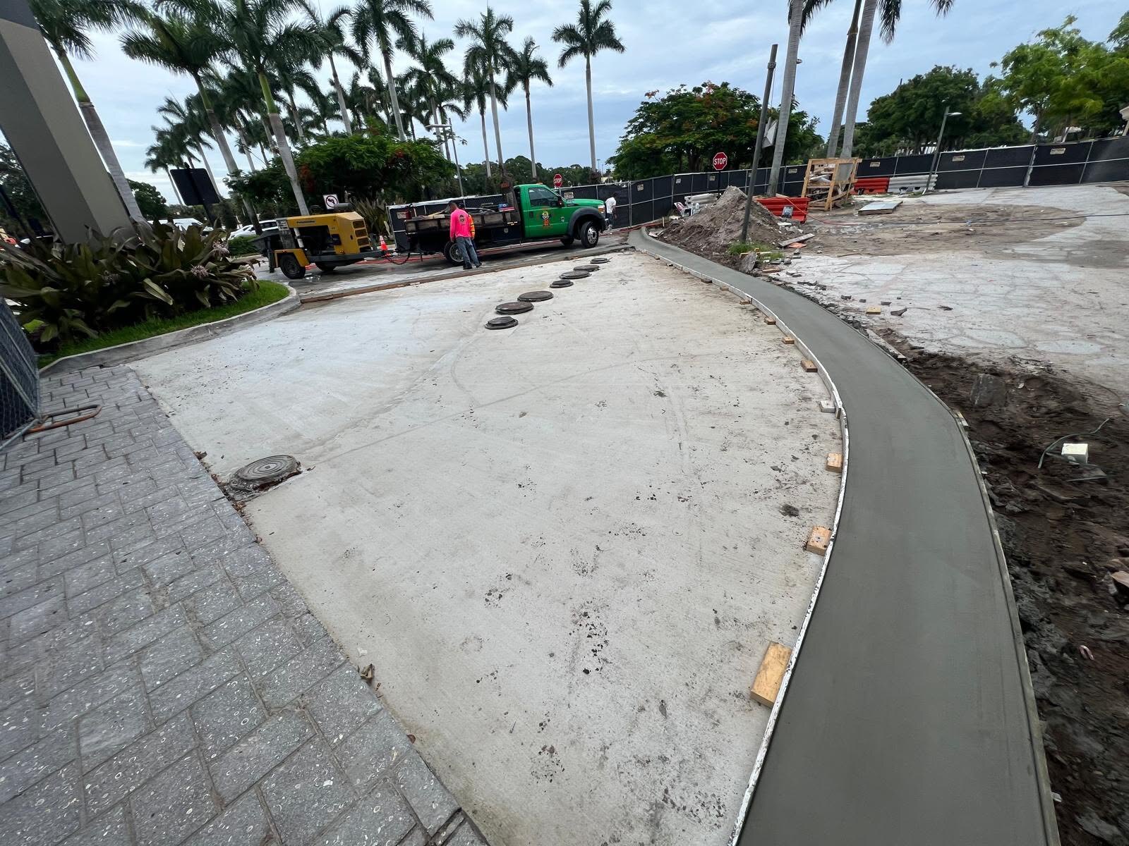 Freshly placed curved concrete curb