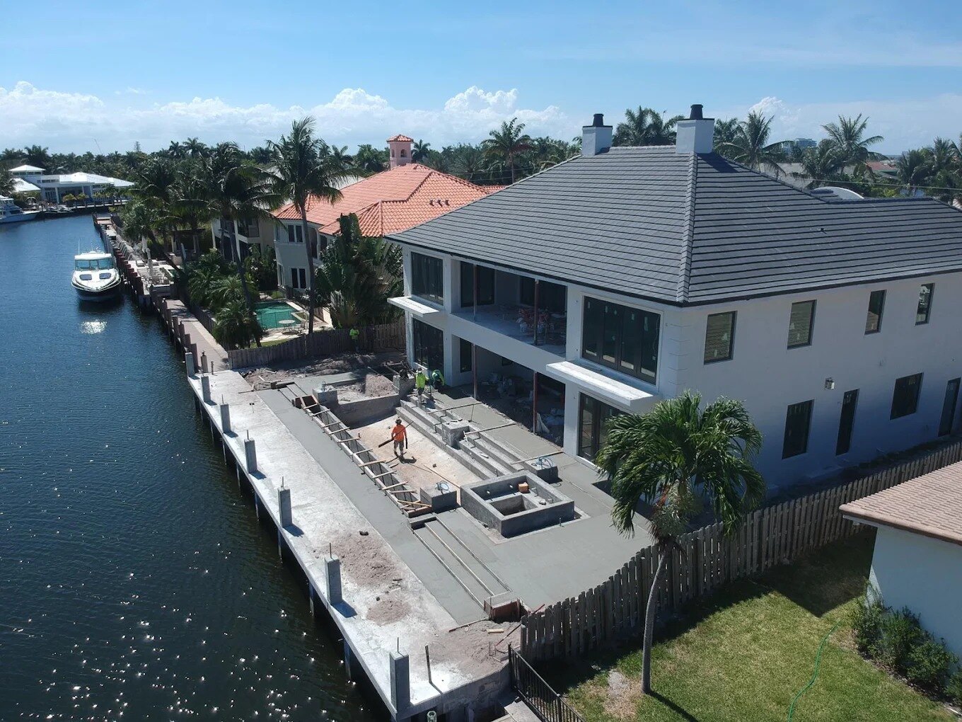 Exterior concrete flatwork at a waterfront residence