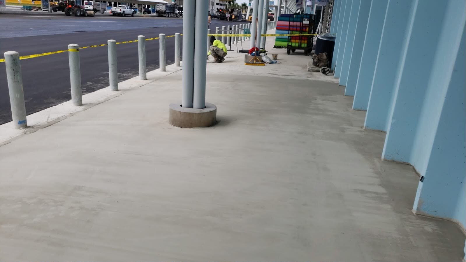 Restored concrete surface at an active commercial facility